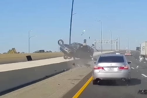 Watch A Land Rover Defender 110 Roll Six Times Across A Highway In ...