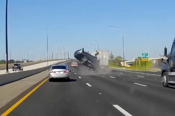 Watch A Land Rover Defender 110 Roll Six Times Across A Highway In ...