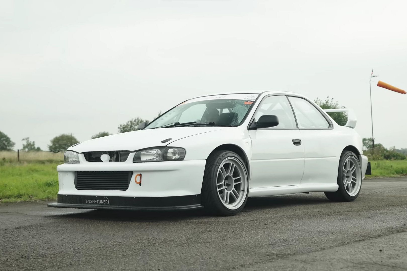 600-HP Drag Race: Nissan Skyline GT-R R32 Vs. Subaru Impreza WRX