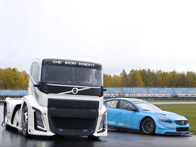 Volvo Racerbil 2,400-HP Semi Races Volvo Race Car On The Track