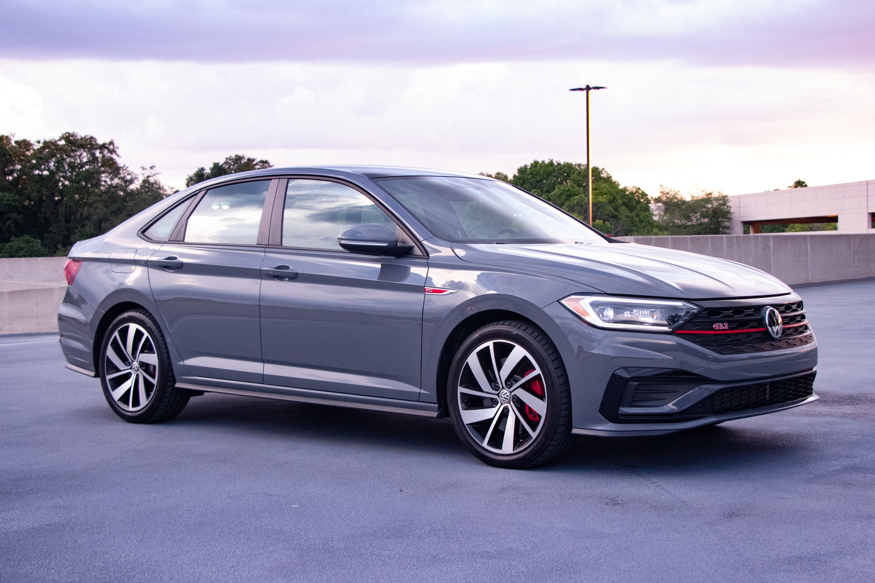2019 Volkswagen Jetta GLI shown from an exterior angle highlighting sporty stance and performance trim details