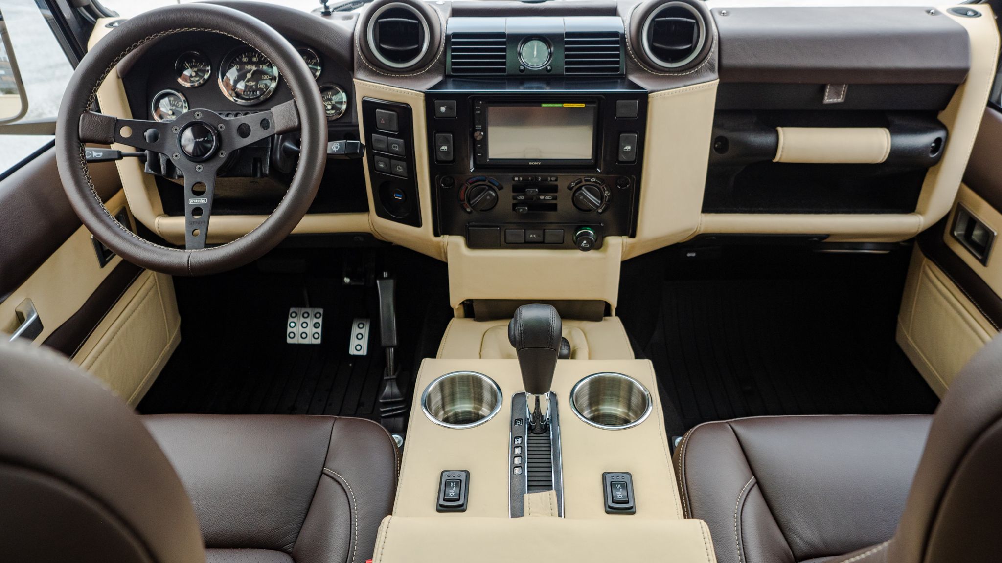Custom Defender Packs Big V8 And Even Bigger Glass Roof