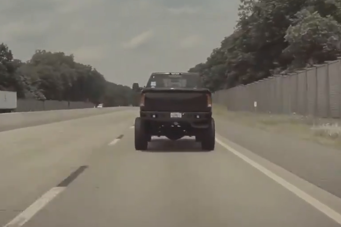 Watch This Moron Dangerously Coal Roll A Tesla